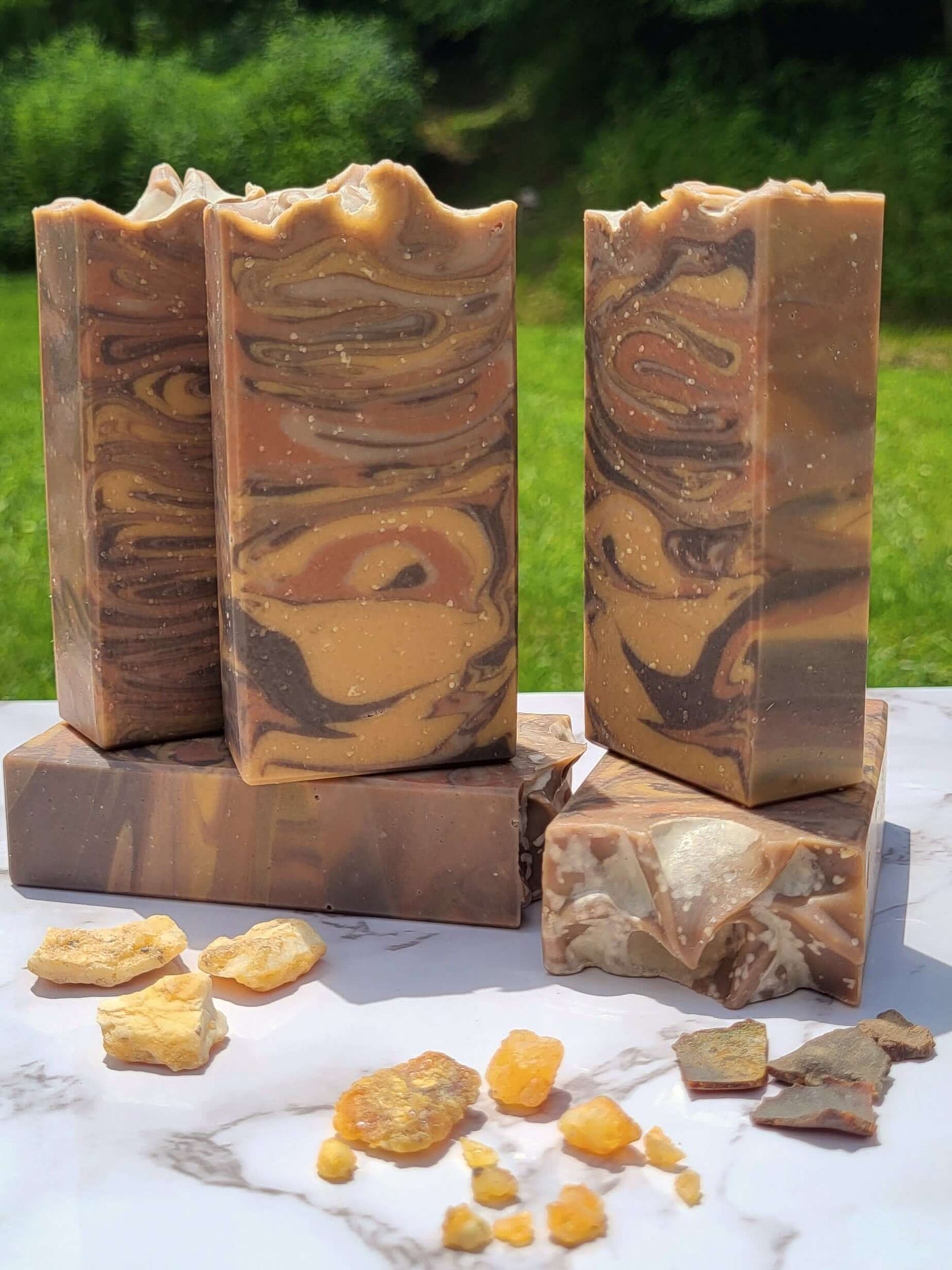 Cold Process Lard Soap. Brown, gold, and copper bars of soap with resin incense