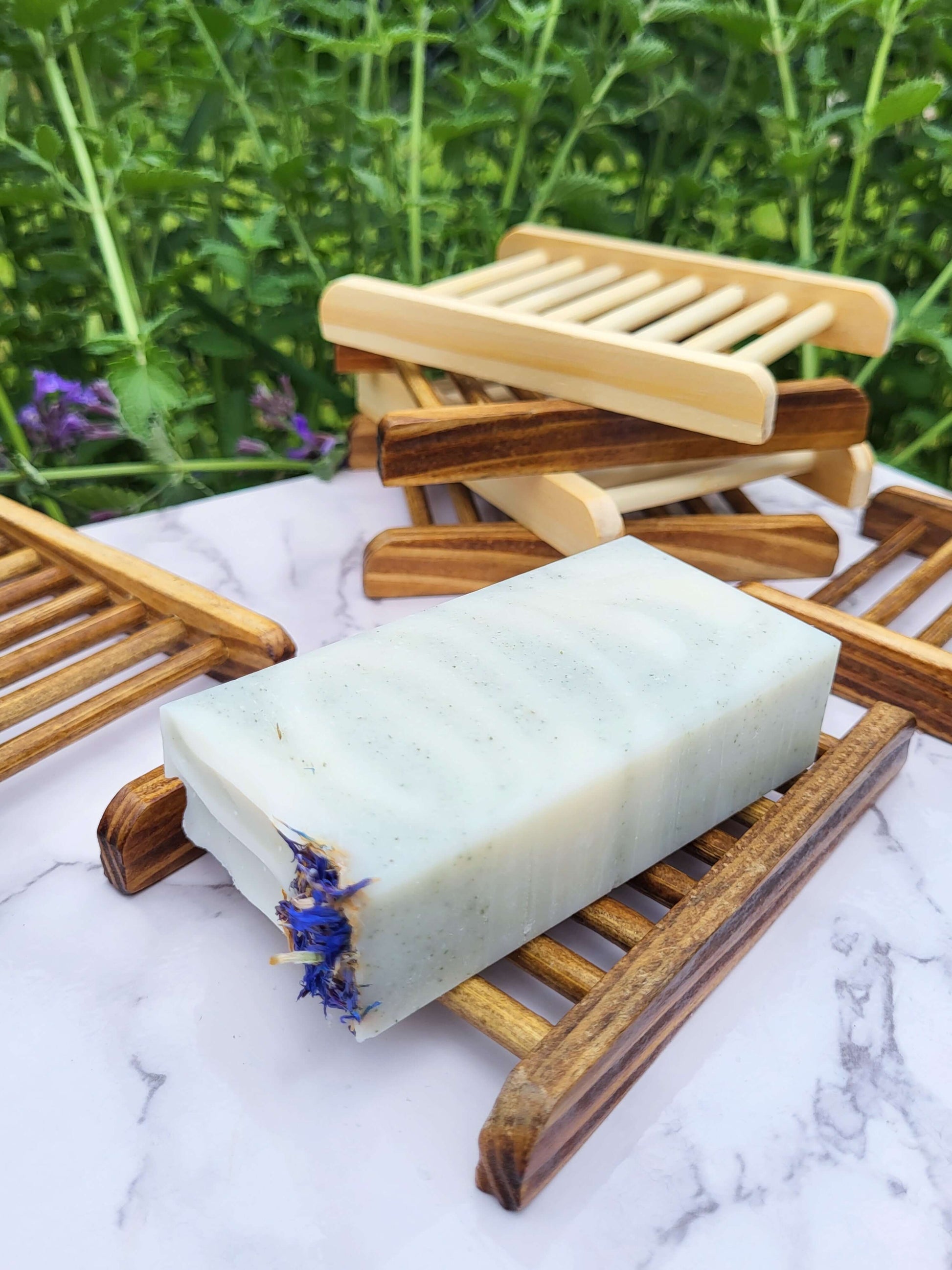 Old fashioned lard soap on natural bamboo soap dish