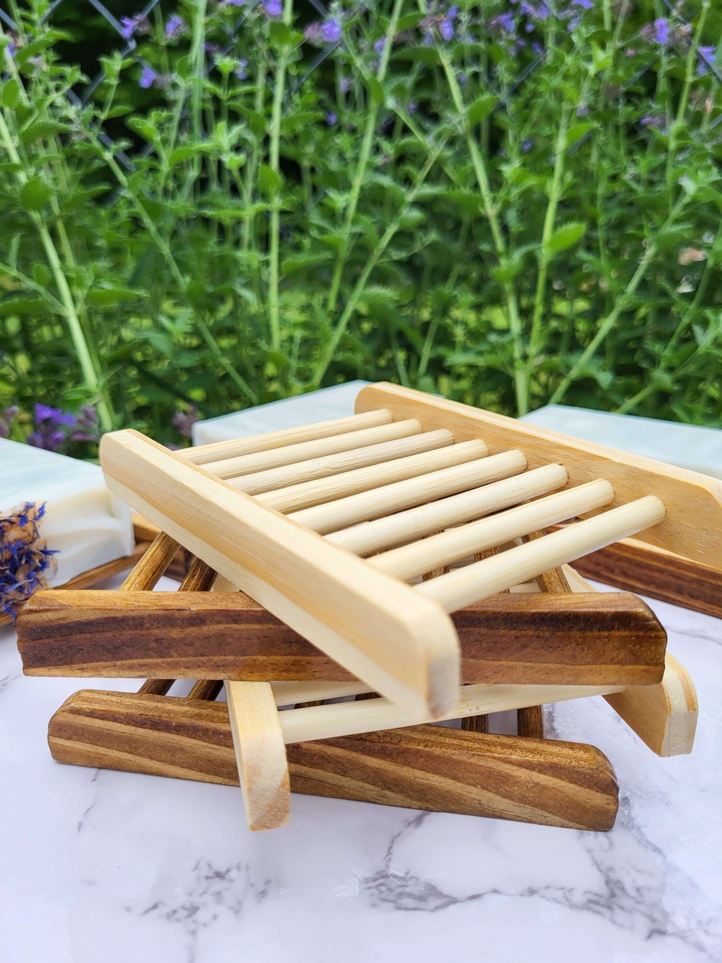 Stack of natural bamboo soap dishes