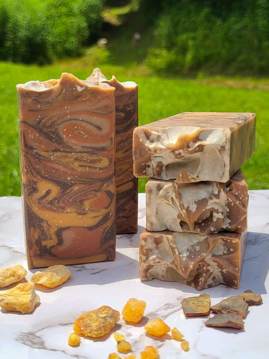 Cold Process Lard Soap. Brown, gold, and copper bars of soap with resin incense